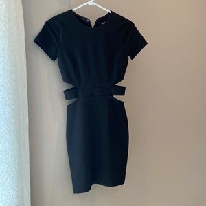 Black short-sleeved Junior cocktail dress with side cut outs